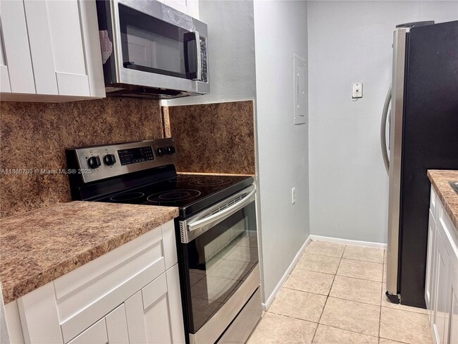 1186 Lake Terry Dr in West Palm Beach, FL - Building Photo - Building Photo
