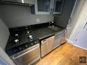Avenue A in New York, NY - Building Photo - Building Photo