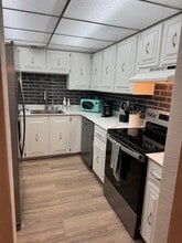 1415 Ocean Shore Blvd, Unit 309 in Ormond Beach, FL - Foto de edificio - Building Photo