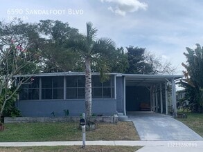 6590 Sandalfoot Blvd in Boca Raton, FL - Building Photo - Building Photo