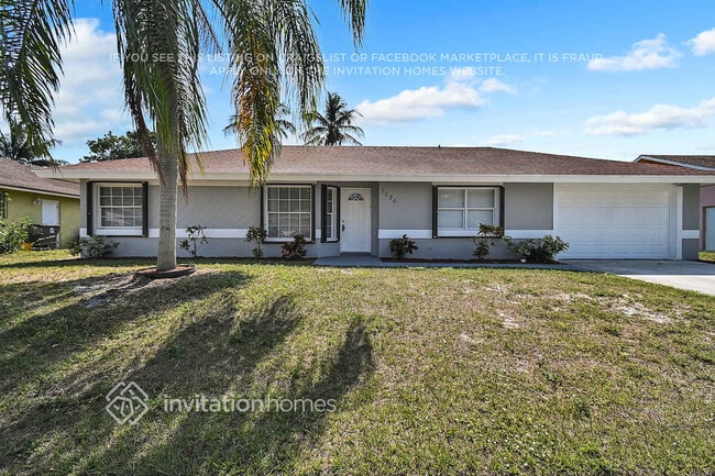 1296 Woodcrest Rd S in West Palm Beach, FL - Foto de edificio - Building Photo