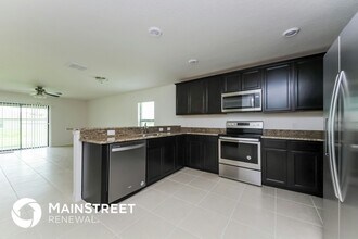 1455 Swan Lake Cir in Dundee, FL - Building Photo - Building Photo