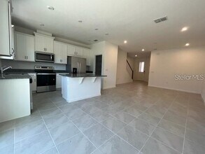1160 Lakeshore Breeze Pl in Kissimmee, FL - Foto de edificio - Building Photo