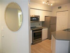 8880 Colonnades Ct W-Unit -412 in Bonita Springs, FL - Building Photo - Building Photo