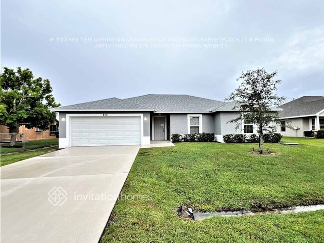 property at 408 SW Ewing Ave