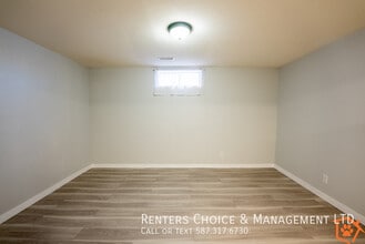 Two Bedroom Basement Suite, Utilities Included,  Close to University in Lethbridge, AB - Building Photo - Building Photo