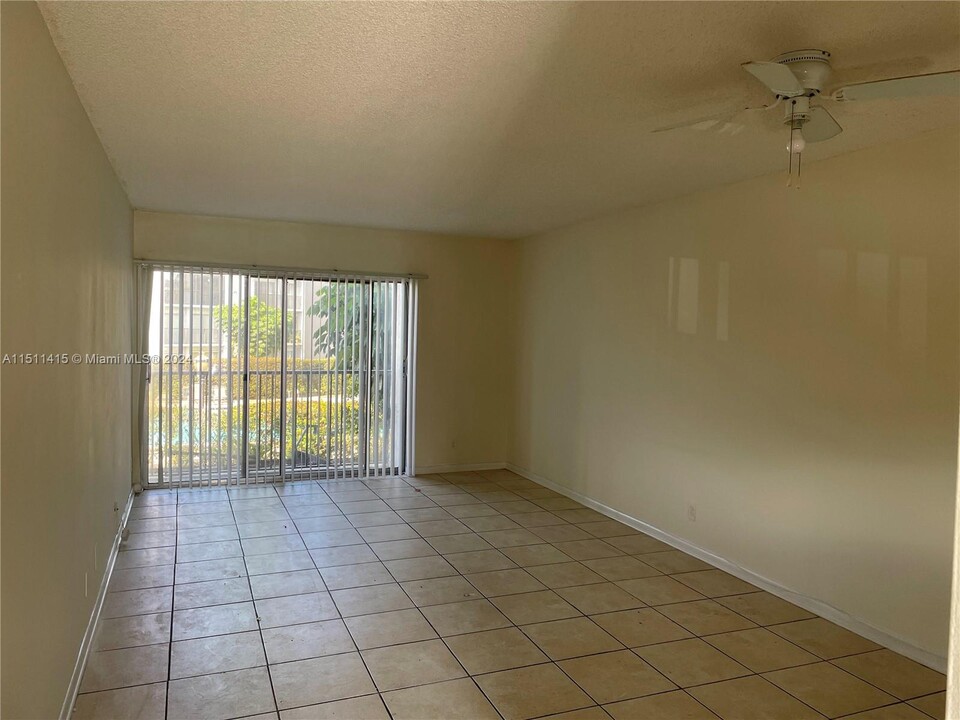 8610 N Sherman Cir, Unit 203 in Miramar, FL - Building Photo