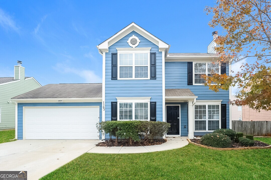 1163 Millwood Dr in Riverdale, GA - Building Photo