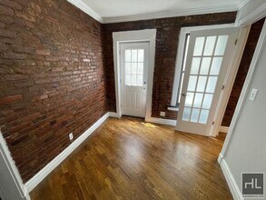 E 13TH ST., Unit 05E in New York, NY - Building Photo - Building Photo