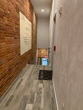 106 W Michigan Ave, Unit The Flat in Marshall, MI - Building Photo - Building Photo