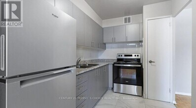 3875 Sheppard Ave E in Toronto, ON - Building Photo - Building Photo