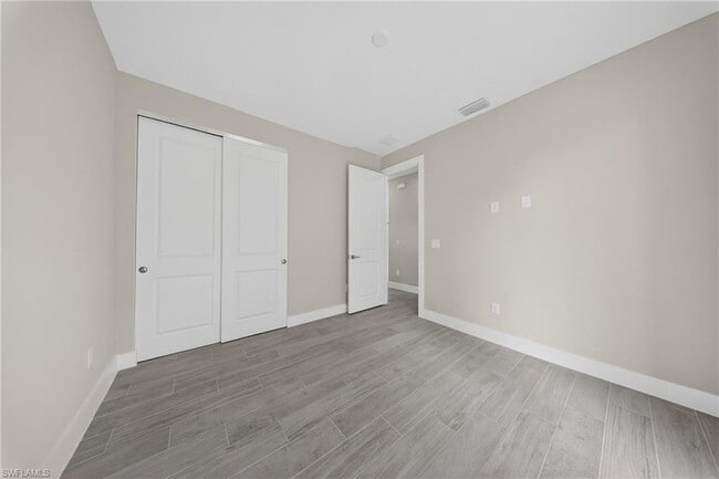 1204 Moore Ave in Lehigh Acres, FL - Building Photo - Building Photo
