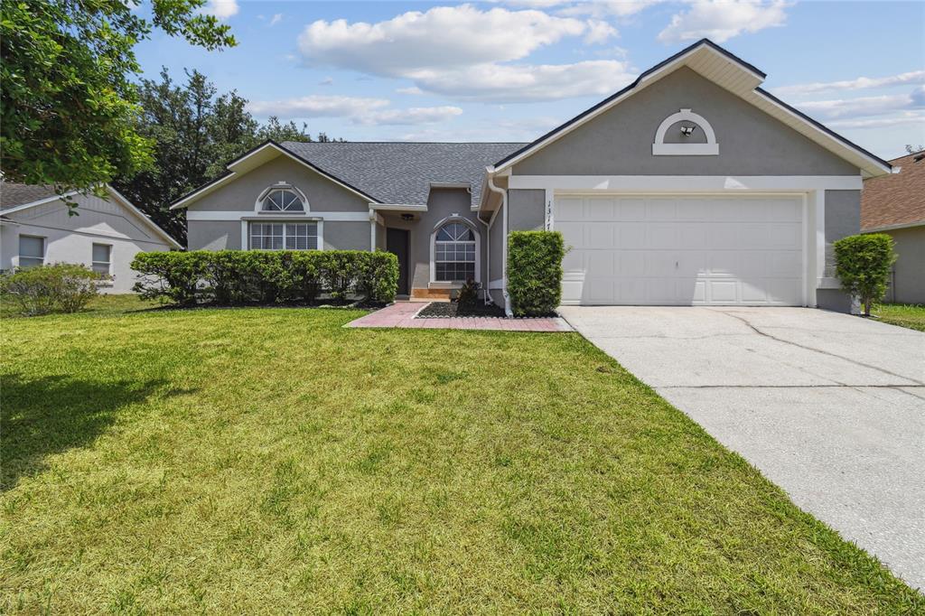 1317 Ravida Woods Dr in Apopka, FL - Building Photo