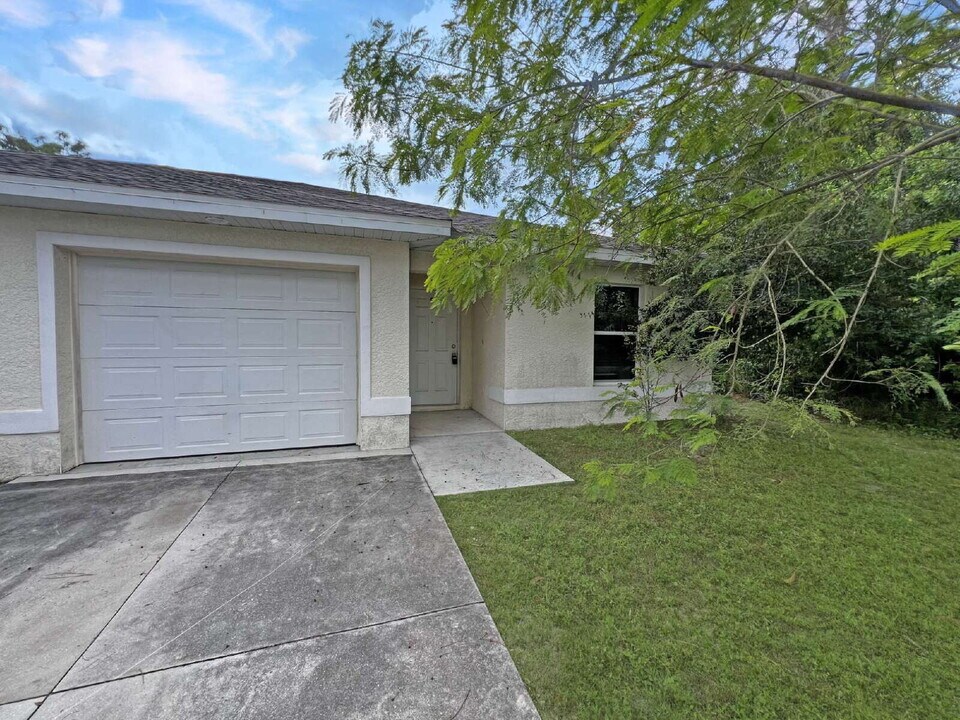 4987 28th St SW in Lehigh Acres, FL - Foto de edificio