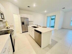 6935 Harbours Edge Ave in Greenacres, FL - Building Photo - Building Photo