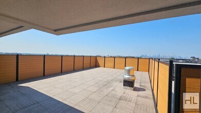 Modern Studio with Heated Bathroom Floor | in Queens, NY - Building Photo - Building Photo