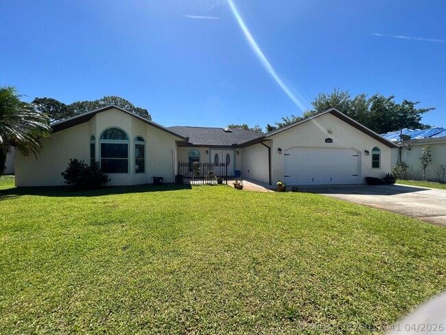 property at 1925 SE Cheltenham St