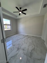 2401-2403 Millie Ave S in Lehigh Acres, FL - Building Photo - Building Photo