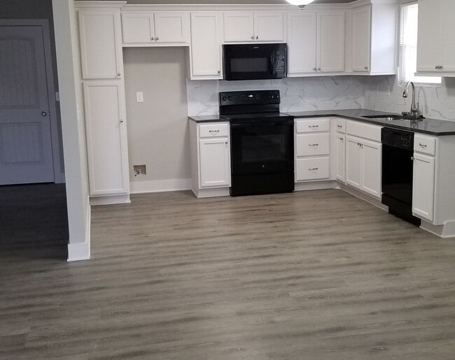 property at 504 SE Oak Ridge Dr