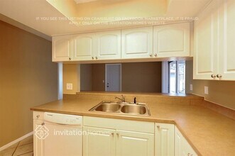 4128 Gray Squirrel Ln, Unit 1-408 in New Port Richey, FL - Foto de edificio - Building Photo