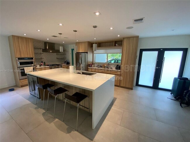 property at 6910 SW 64th Ave