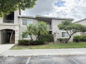 5015 Wiles Rd in Coconut Creek, FL - Building Photo
