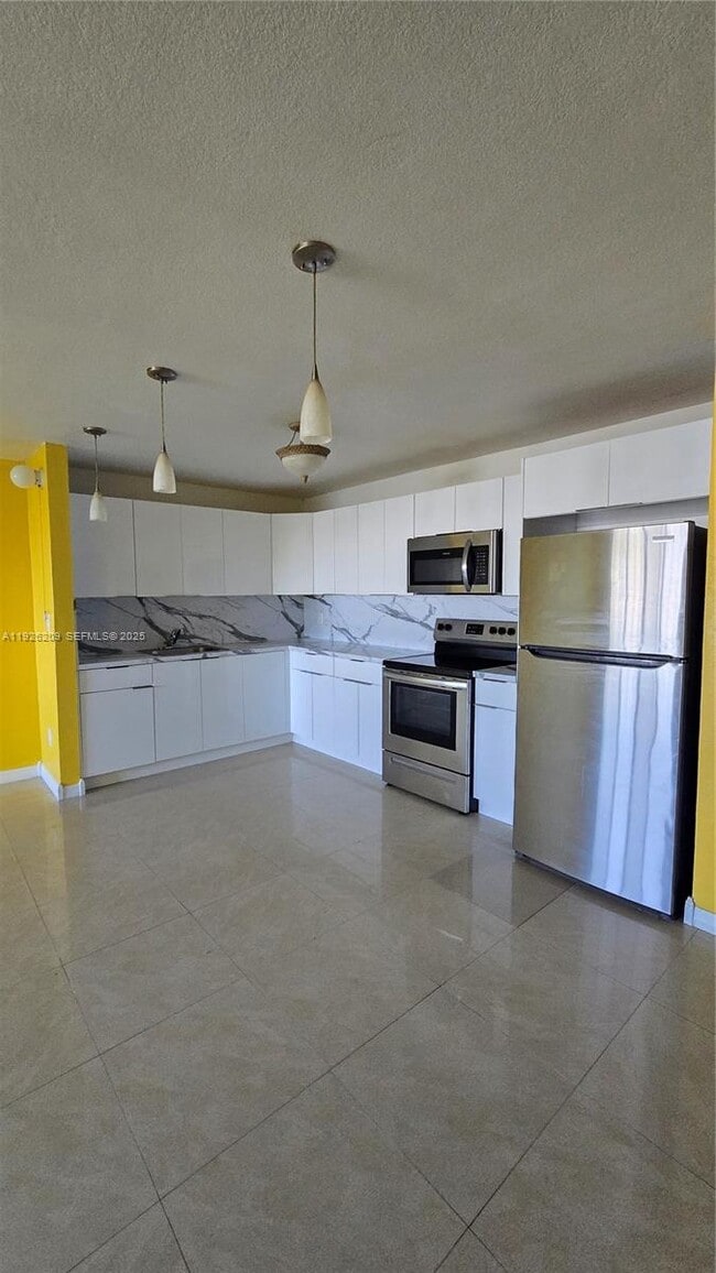 property at 14830 Naranja Lakes Blvd