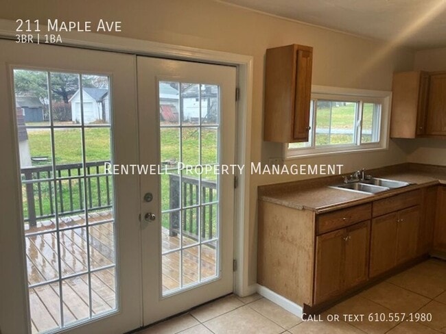 property at 211 Maple Ave
