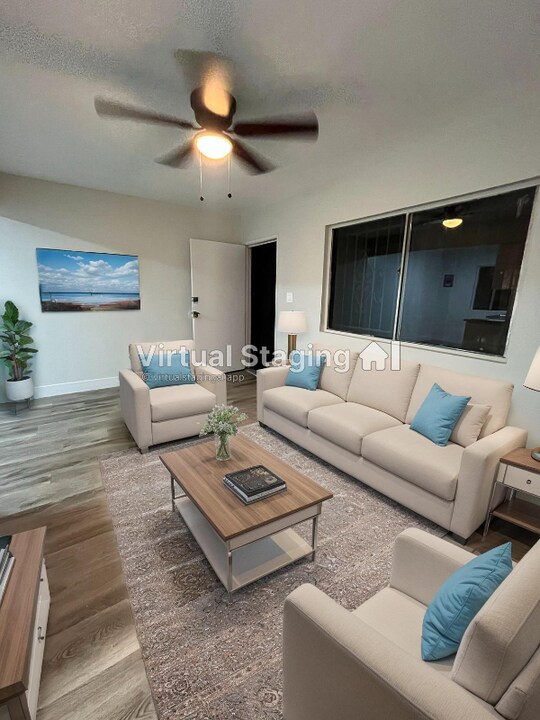 7400 S Hoover St in Los Angeles, CA - Building Photo