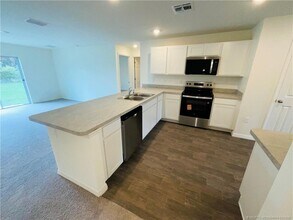 1701 SE Manth Ln in Port St. Lucie, FL - Building Photo - Building Photo