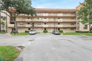 6001 N Falls Cir Dr in Lauderhill, FL - Building Photo