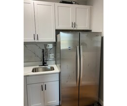 1211 Poplar Grove St in Baltimore, MD - Foto de edificio - Building Photo