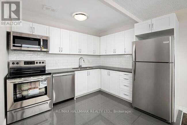 3101 Eglinton Ave E in Toronto, ON - Building Photo - Building Photo