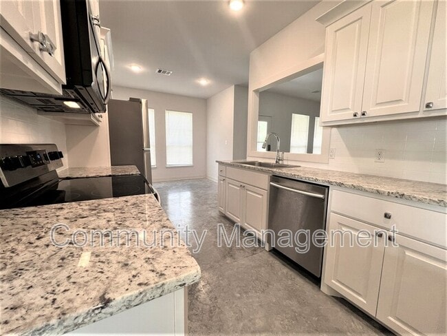 7677 River Ridge Dr in Denham Springs, LA - Building Photo - Building Photo