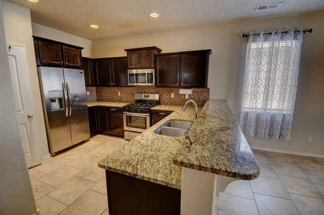1039 Jacob's Dr NE in Rio Rancho, NM - Building Photo - Building Photo