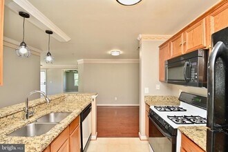 14162 Cuddy Loop-Unit -201 in Woodbridge, VA - Building Photo - Building Photo