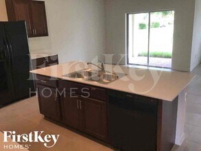 411 SE 24th St in Cape Coral, FL - Building Photo - Building Photo