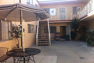 Stone Arbor on Benedict Apartments in Downey, CA - Building Photo - Building Photo