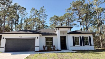 7432 N Cricket Dr in Citrus Springs, FL - Building Photo
