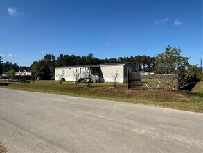 239 Road 5027 Rd in Cleveland, TX - Building Photo - Building Photo