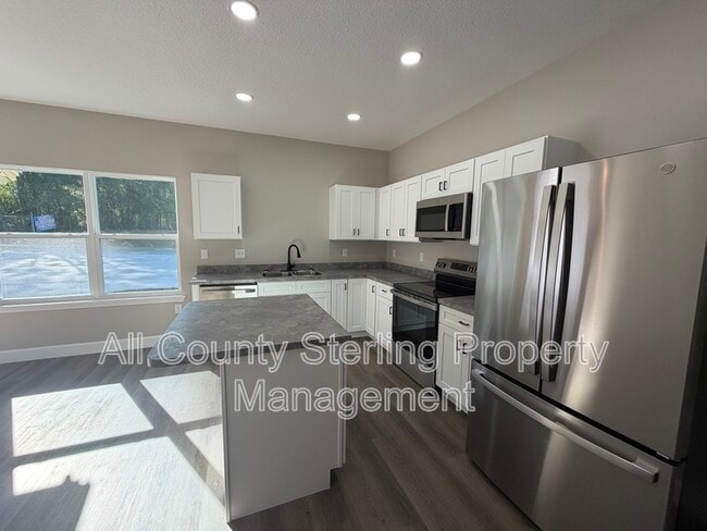 property at 1418 SE Magnolia Loop