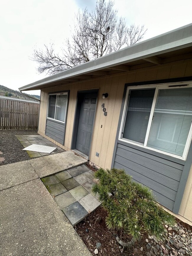 property at 396 NE Miguel Ave