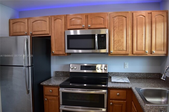 property at 8590 Sunrise Lakes Blvd