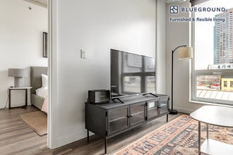 61 W Erie St, Unit SI FL4-ID1409 in Chicago, IL - Building Photo - Building Photo