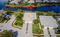 6939 Cay Ct in Naples, FL - Foto de edificio - Building Photo