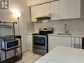 113-2351 Kennedy Rd in Toronto, ON - Building Photo - Building Photo