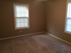 713 E Monroe St-Unit -Apt A in Pittsburg, KS - Building Photo - Building Photo