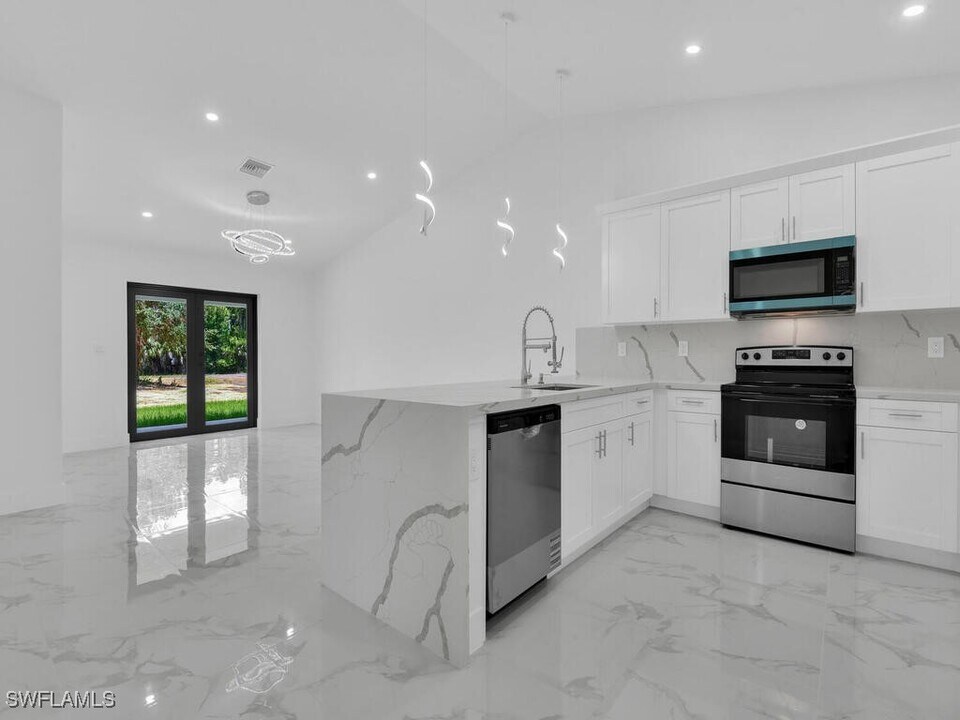 4738-4740 Douglas Ln in Lehigh Acres, FL - Building Photo