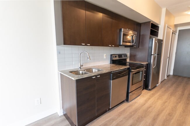 105-105 The Queensway in Toronto, ON - Building Photo - Building Photo