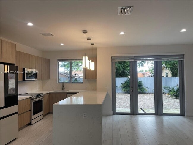 property at 3155 NW 103rd St
